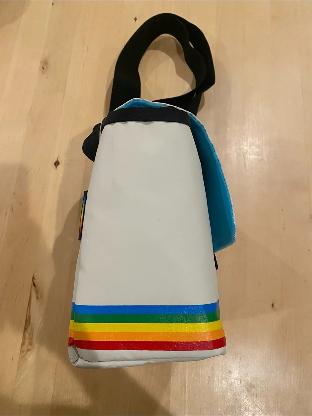 Polaroid White Messenger Bag with Rainbow Stripes and Black Strap